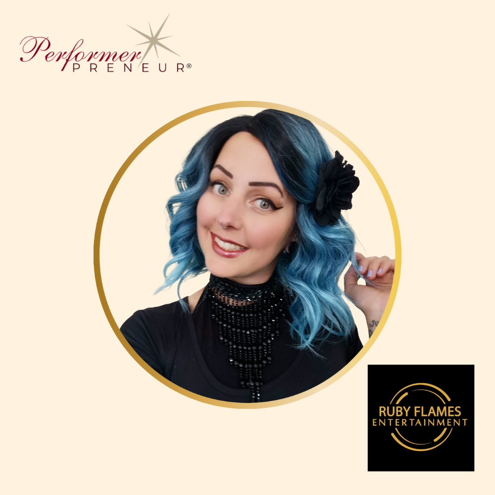 Branded graphic featuring the PerformerPreneur logo in the top left, a circular portrait of a smiling woman with blue hair, a black flower accessory, and a black beaded choker in the center, and the Ruby Flames Entertainment logo in the bottom right.